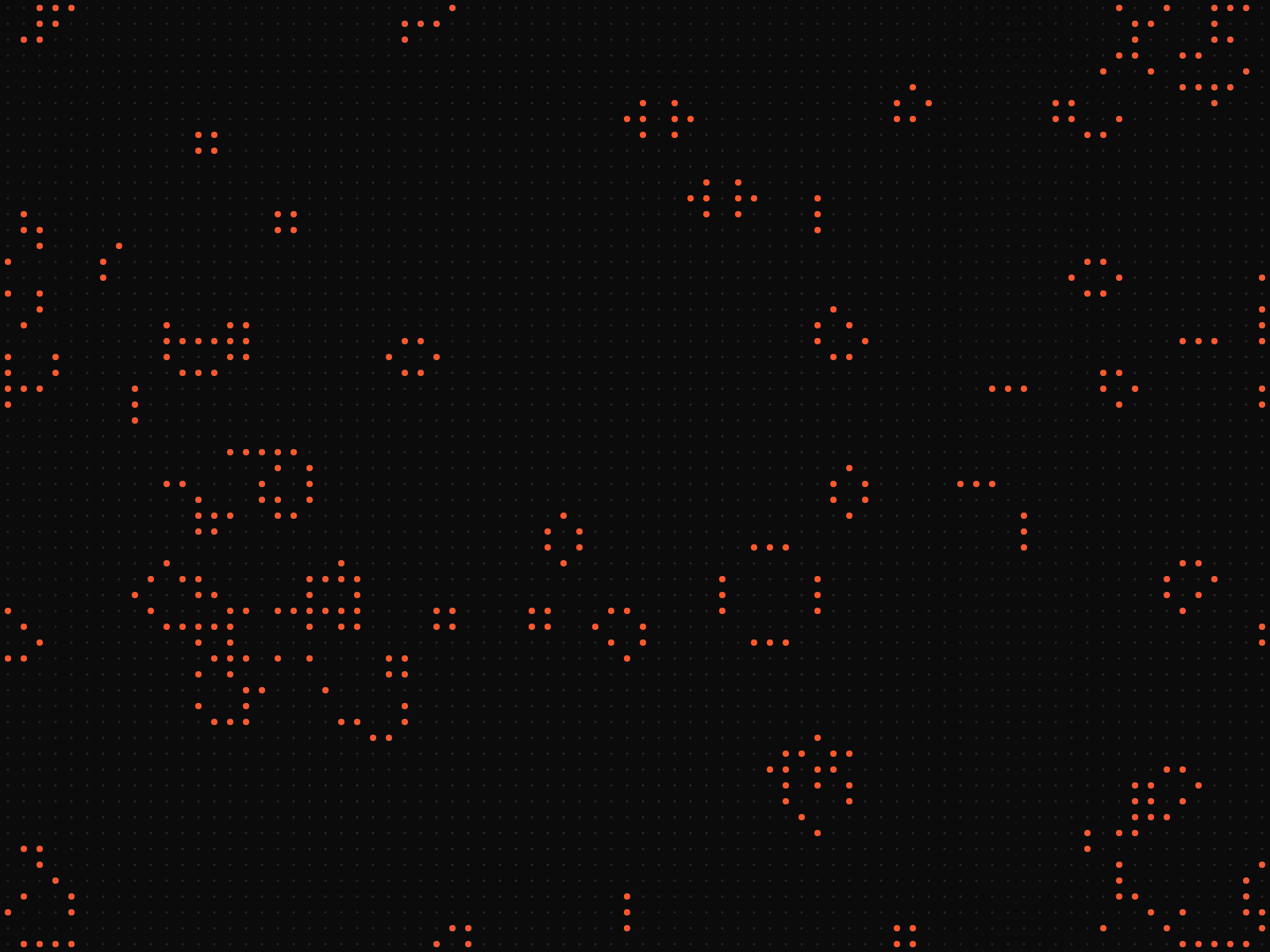 A dark dot grid with clusters of orange live cells
